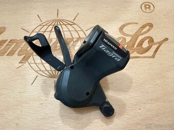 2x MTB řídítka + rohy + 1x Shimano řazení - 4