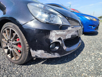 Přední nárazník Clio III RS originální s otvory na ostřiky - 4