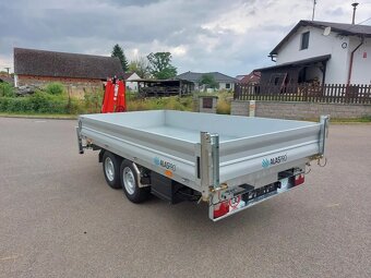 Třístranný sklápěč s rukou - 4