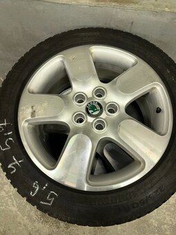 Disky a pneu z Octavia Scout 225/50 r17 94 W / 7J X 17 ET 50 - 4