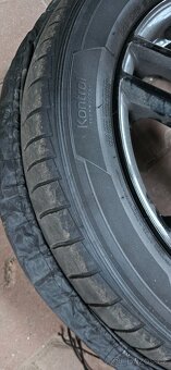 Prodám sadu Dezent TR black+letní pneu - 4