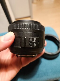Nikkor 35 mm f/1,8 G DX AF-S pro Nikon F - 4
