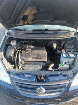 Suzuki liana 1,6i 78kw 4x4 - 4