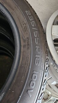 235/55R18 - 4