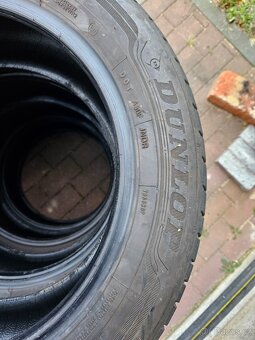 Letní pneu Dunlop, komplet kola plech Octavia, poklice Škoda - 4