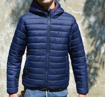 Chlapecká tmavomodrá prošívaná bunda vel. 158 - 4