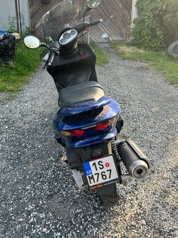 skutr Yamaha 125 - 4