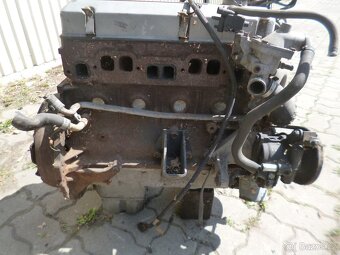 Motor benzin Opel Frontera 2,4 - 4