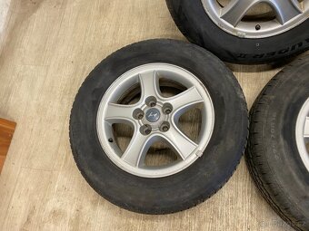ALU KOLA HYUNDAI R16 5x114,3 6,5Jx16 ET46 S PNEU - 4