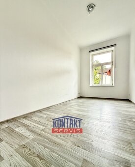 Pronájem prostorného a prosvětleného bytu 3+1 90 m2 v centru - 4