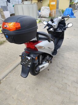 Skůtr - 4