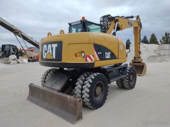 CAT 313D - 4