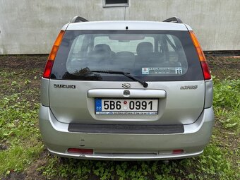 Suzuki Ignis 1,3 68 kw 2008 bourané - 4