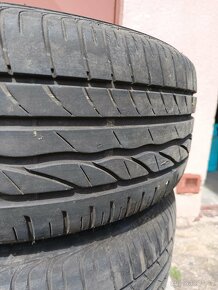 Prodám letní pneu 215 55 R16 97W s disky - 4