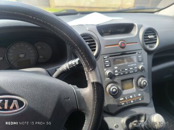 Kia Carens - 4