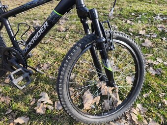 ROCKRIDER Dětské horské kolo 20" ST500 6–9 let
- 4