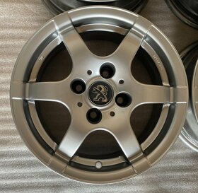 -výprodej- nová alu kola 14", rozteč šroubů 4x108 - 4