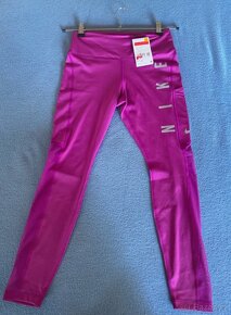 Nove leginy Nike , velikost na visacce - 4
