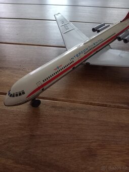 Staré plechové letadlo na setrvačník - 4