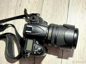 Nikon D7000 + Objektiv Nikor 18-105 mm - 4