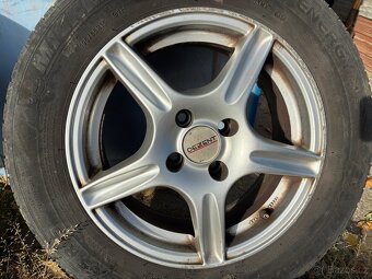 Alu Dezent , rozteč 4x100  6,5x15 sted 60.1 195/65/R15 - 4
