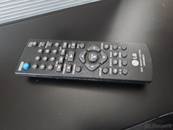 DVD přehrávač LG plus dva kufry s DVD - 4