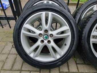 Alu kola Skoda 5x100 r16 6,5j et43 pneu 215/45/16 - 4