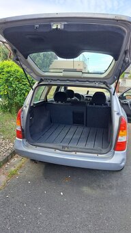 Opel Astra 1,8 benzín kombi 2 sady pneu - 4
