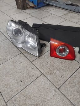 Vw B6 světla, roleta kufru,maska. - 4