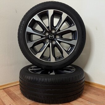 MAZDA CX-3 5x114,3 R18 ET50+LETNÍ 215/50R18 6,5mm - 4