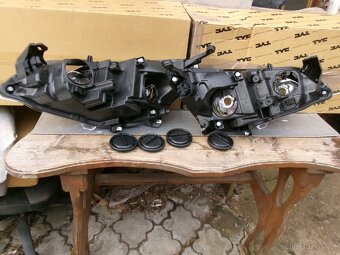 OPEL ASTRA J , 2012 - PŘEDNÍ  SVĚTLA - 4