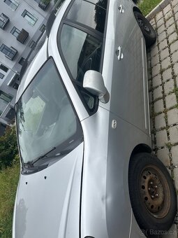 Kia carens - 4