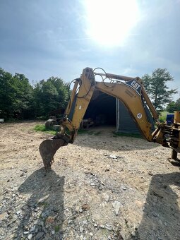 CAT 432 D - 4