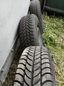 Zimní pneu s disky 165/70 r 14 z fabia 1 - 4