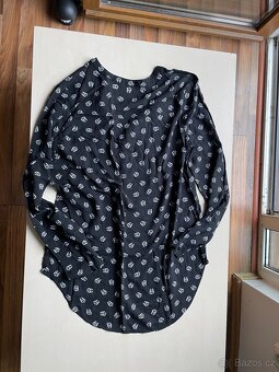 Košile s lebkou, vel není uvedena cca S-M, měřte - 4