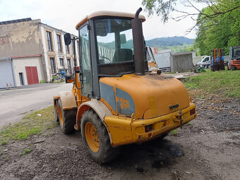 Kolový nakladač JCB 407 - - 4