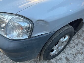 Mazda tribute 2.0 benzin 2004 - 4