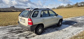 Kia Sportage II 2.0i 4x4 - 4