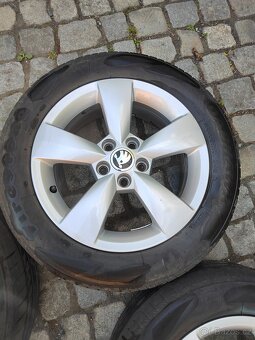 Prodám orig alu 15 škoda Fabia Rapid 5x100 ET 38 letní k. O - 4