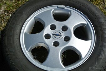 ALU kola Opel 15" 5x110 ET49 - 4