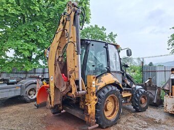 CATERPILLAR 428 E - 4