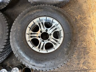 ALU KOLA MITSUBISHI 15X71/2JJ ET -8 6X139.7 PNEU 31X10.50R15 - 4