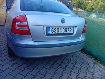 Prodám komplet zadní páté dveře ,vrata na škoda Octavia 2, s - 4