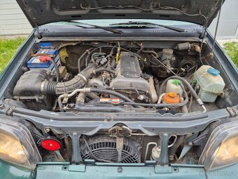 Suzuki Jimny 1.3i - 4