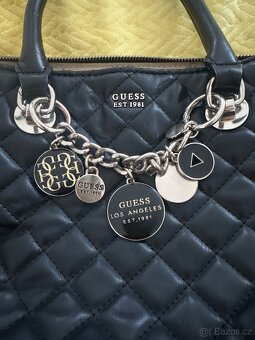 Guess - 4