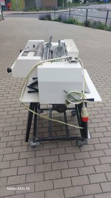 Rohlíkovací stroj TOPOS - 4