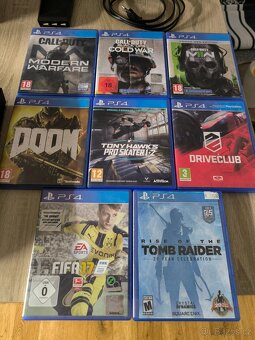 PlayStation 4 (PS4) 1TB + 8 her - 4