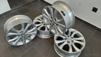 Alu kola Mazda 7Jx17 ET-52,5 5x114,3x67 - 4