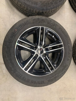 Komplet kola 6,5x15 4x100 + PremiumContact 6 185/65 R15 - 4