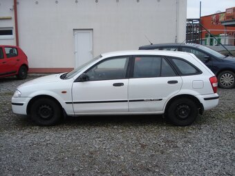 Mazda 323 F 1.3 i - 4
